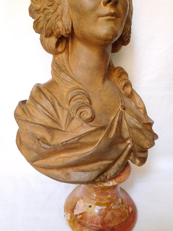 Terracotta bust of an aristocrat on a marble base, 18th century style, 19th century production