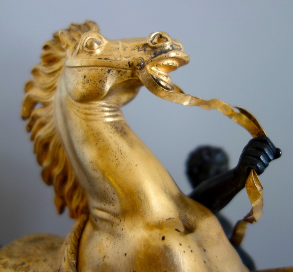Cheval de Marly groupe en bronze patiné et doré au mercure d'après Coustou début XIXe siècle