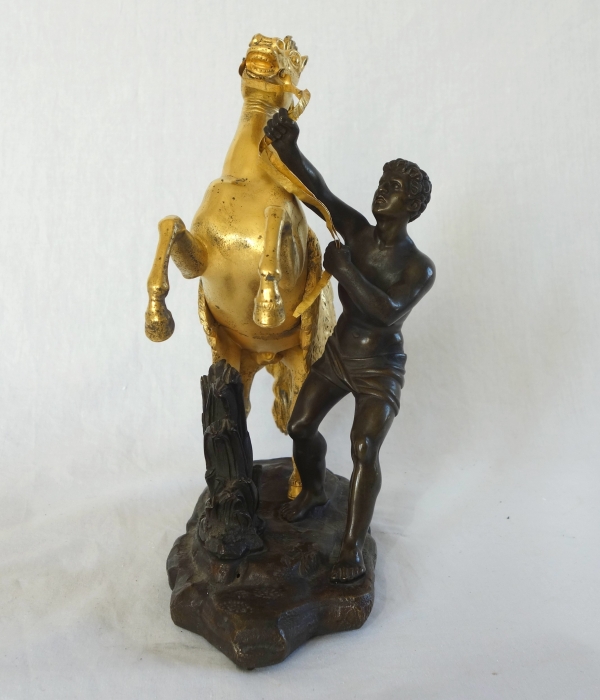 Cheval de Marly groupe en bronze patiné et doré au mercure d'après Coustou début XIXe siècle