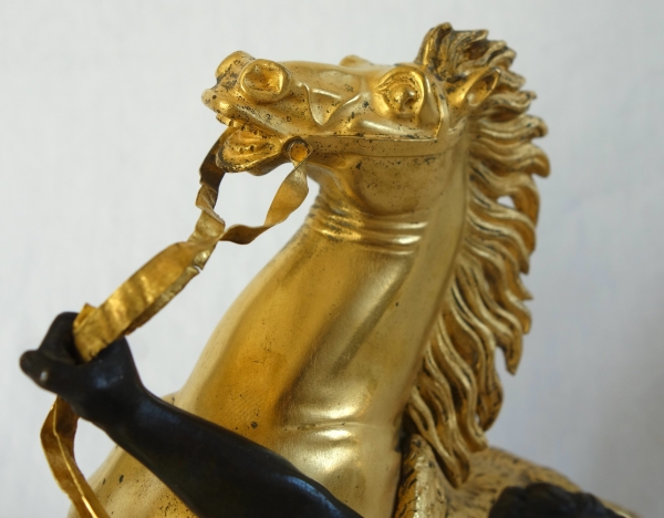Cheval de Marly groupe en bronze patiné et doré au mercure d'après Coustou début XIXe siècle
