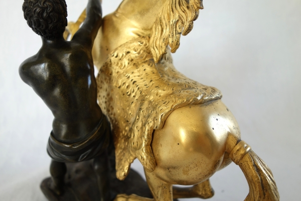 Cheval de Marly groupe en bronze patiné et doré au mercure d'après Coustou début XIXe siècle