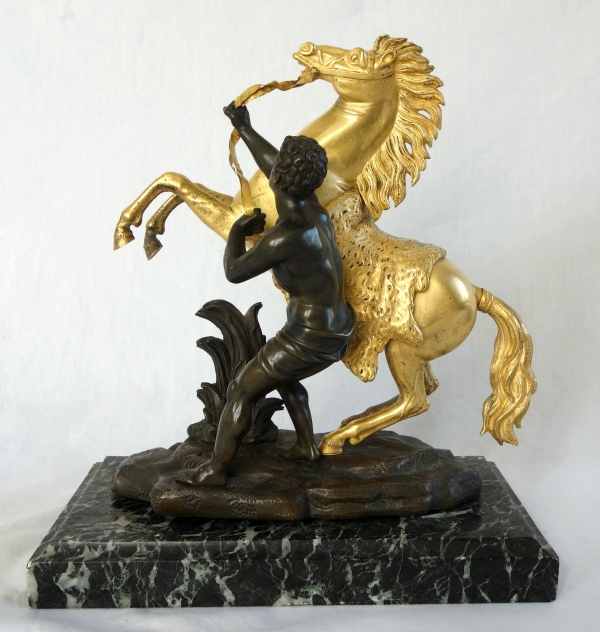 Cheval de Marly groupe en bronze patiné et doré au mercure d'après Coustou début XIXe siècle