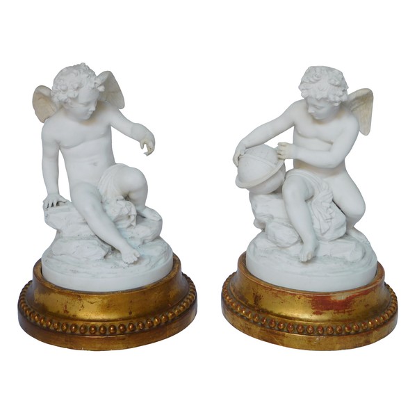 Pair of Nast biscuit statues, early 19th century, gilt wood base