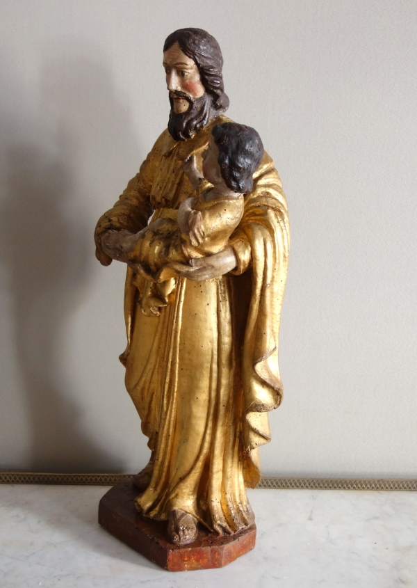 Saint Joseph et l'enfant Jésus : statue en bois doré - Alsace, XVIIe siècle - 72cm