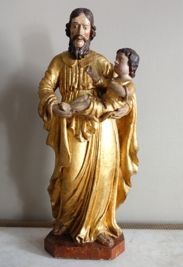 Saint Joseph et l'enfant Jésus : statue en bois doré - Alsace, XVIIe siècle - 72cm