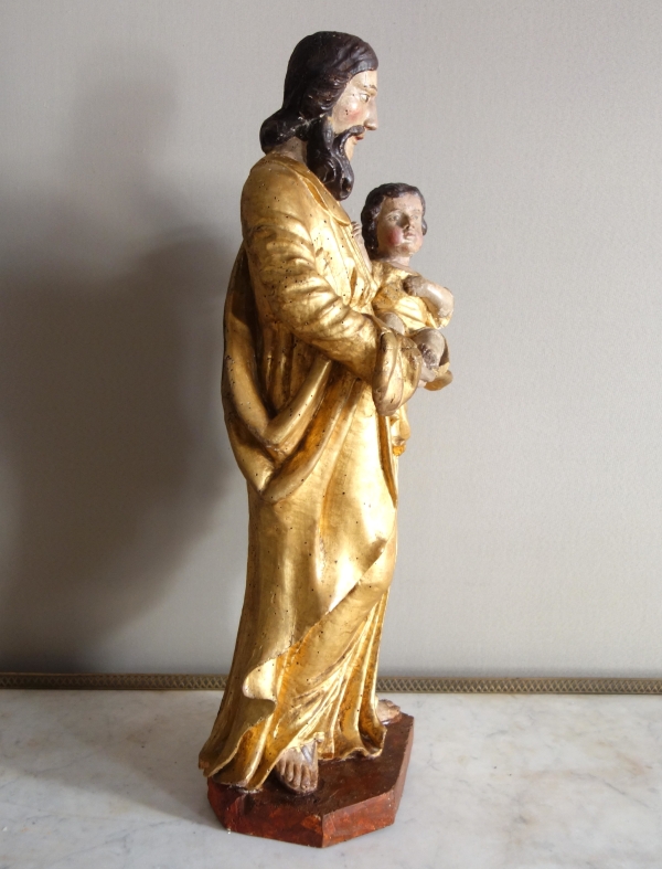 Saint Joseph et l'enfant Jésus : statue en bois doré - Alsace, XVIIe siècle - 72cm