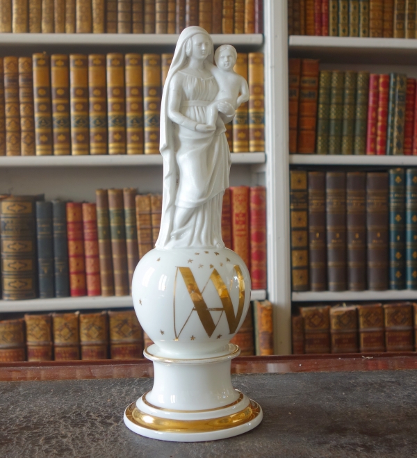 Early 19th century gilt porcelain and biscuit Virgin and Child