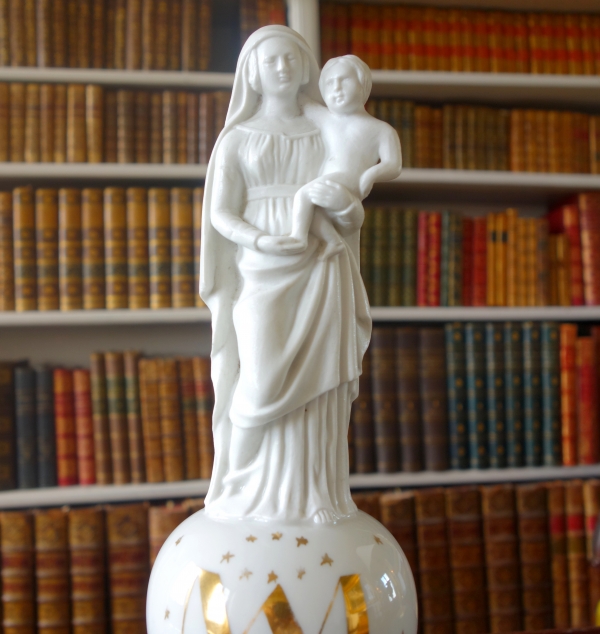 Early 19th century gilt porcelain and biscuit Virgin and Child