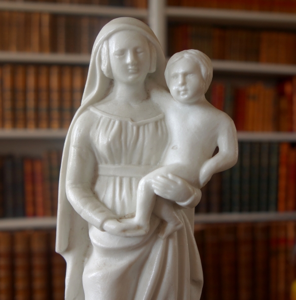 Early 19th century gilt porcelain and biscuit Virgin and Child