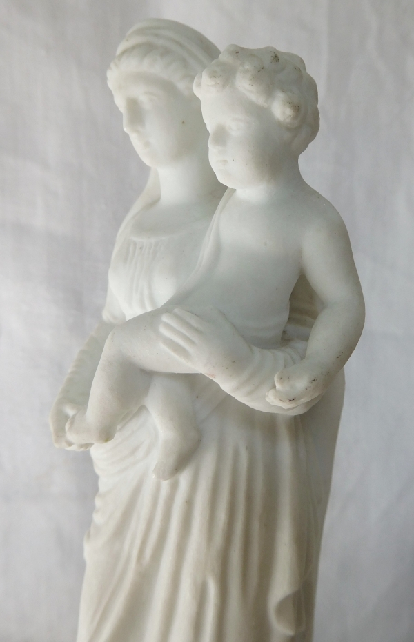 Early 19th century gilt porcelain and biscuit Virgin and Child