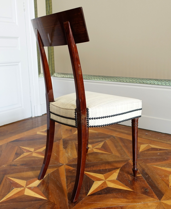 Set of 10 Directoire mahogany dining chairs, horsehair covers, model by Jacob - late 18th century