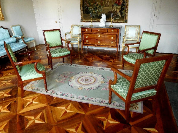 Suite de 4 fauteuils d'officier d'époque Empire en acajou, attribués à Marcion