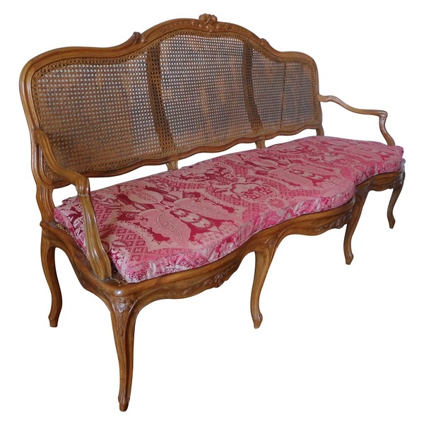 Canned walnut sofa / bench, Louis XV production - 18th century