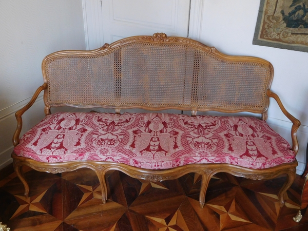 Canned walnut sofa / bench, Louis XV production - 18th century