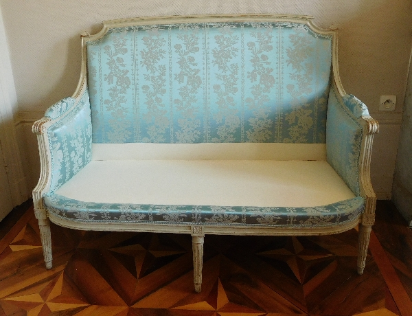 Louis XVI sofa for 2 persons, lacquered wood and blue silk, 18th century