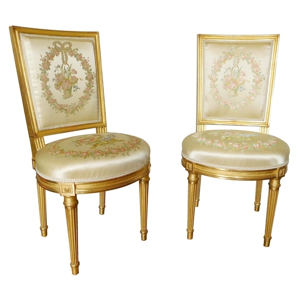 Paire de chaises en bois doré à la feuille d'or de style Louis XVI