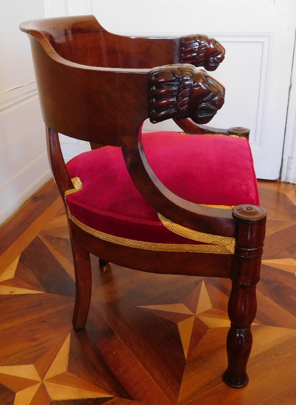 Fauteuil de bureau époque Empire en acajou à têtes de lion