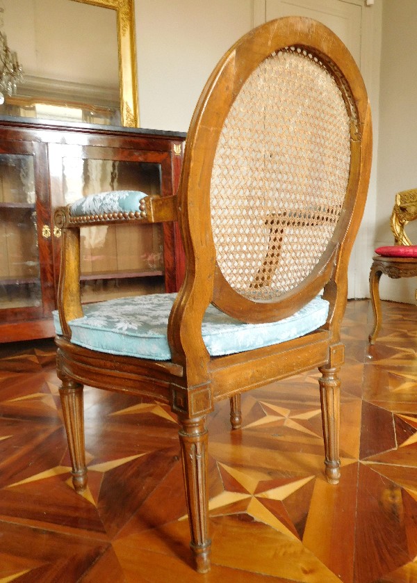 Louis XVI caned walnut desk armchair - France circa 1780