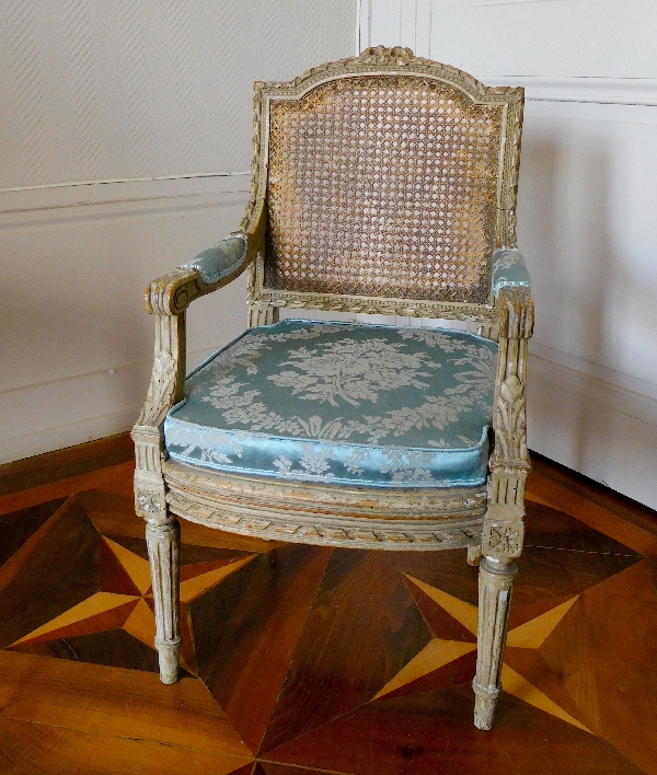 Caned Louis XVI style armchair for a child, silk cushion, 19th century
