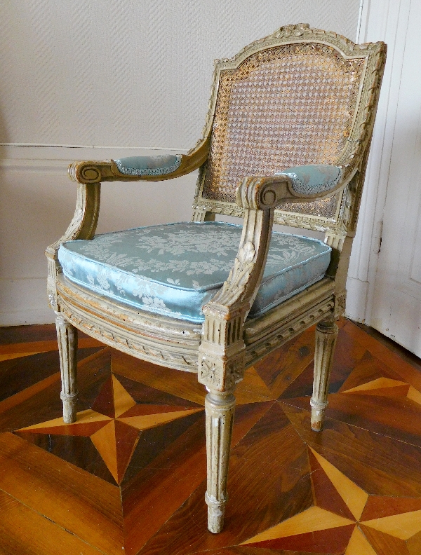 Caned Louis XVI style armchair for a child, silk cushion, 19th century