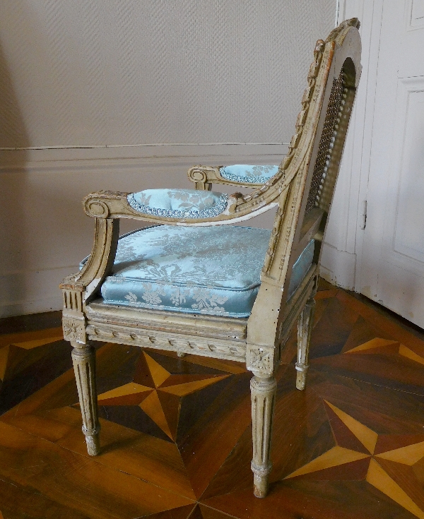 Caned Louis XVI style armchair for a child, silk cushion, 19th century