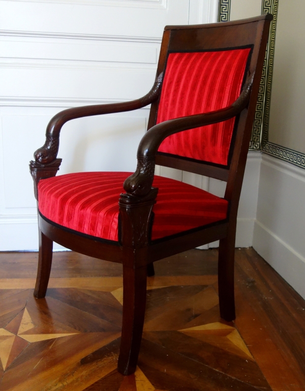 Empire mahogany armchair, dolphin-shaped armrests, early 19th century