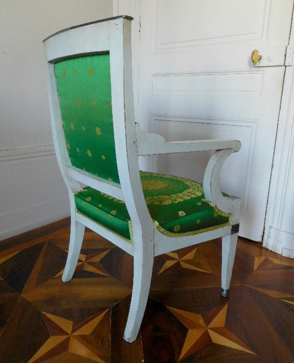 Fauteuil d'officier en bois laqué d'époque Empire, garniture de soie verte à motif placé