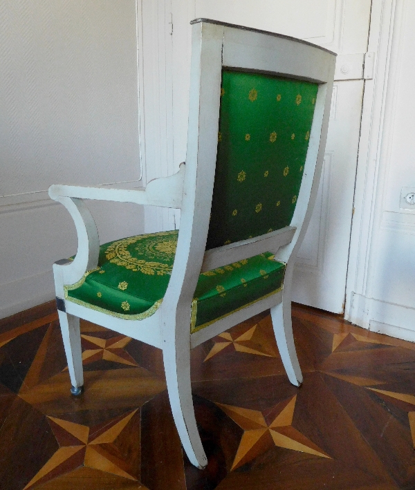 Fauteuil d'officier en bois laqué d'époque Empire, garniture de soie verte à motif placé