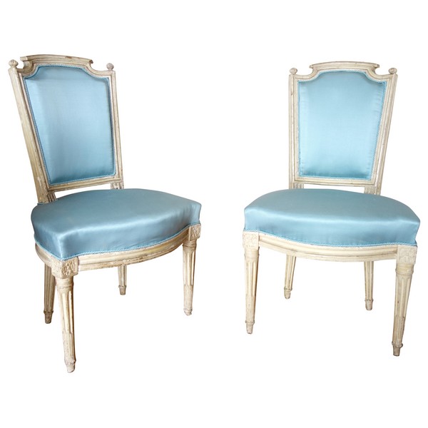 Pair of Louis XVI lacquered cabriolet chairs, light blue silk cover