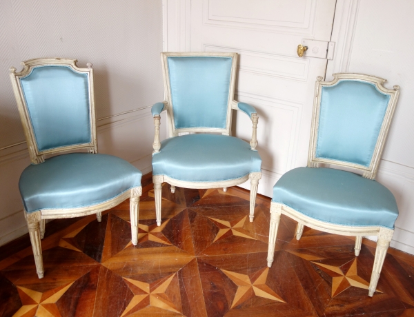 Pair of Louis XVI lacquered cabriolet chairs, light blue silk cover