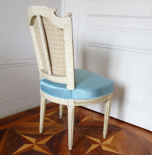 Pair of Louis XVI lacquered cabriolet chairs, light blue silk cover