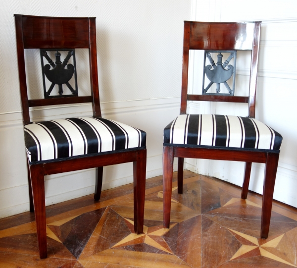 Pair of Empire mahogany chairs, gladius sword on the backrest, 19th century circa 1800