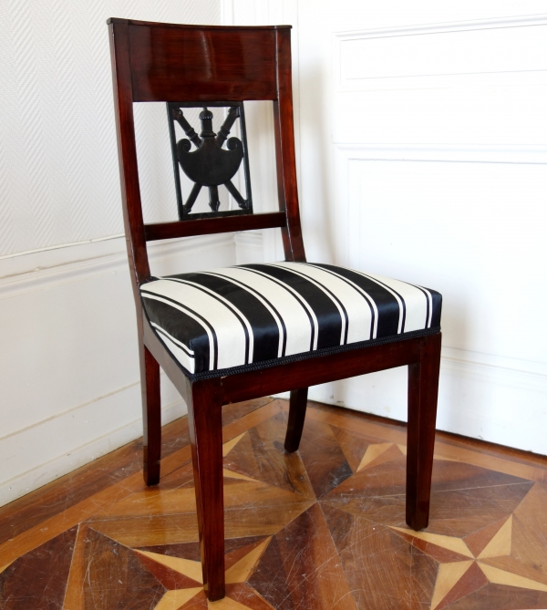 Pair of Empire mahogany chairs, gladius sword on the backrest, 19th century circa 1800