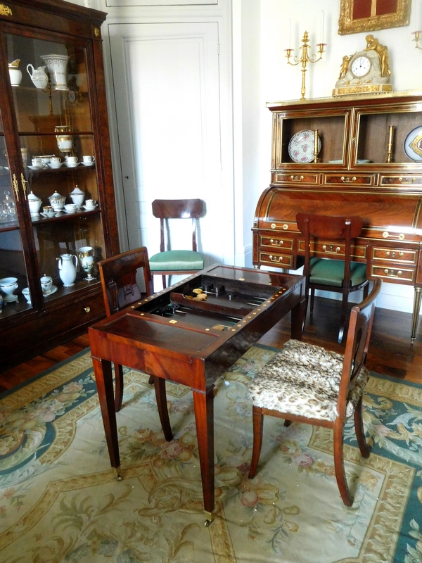 Pair of Empire mahogany chairs, leopard-fashioned cover, early 19th century