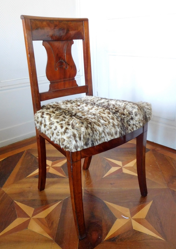 Pair of Empire mahogany chairs, leopard-fashioned cover, early 19th century