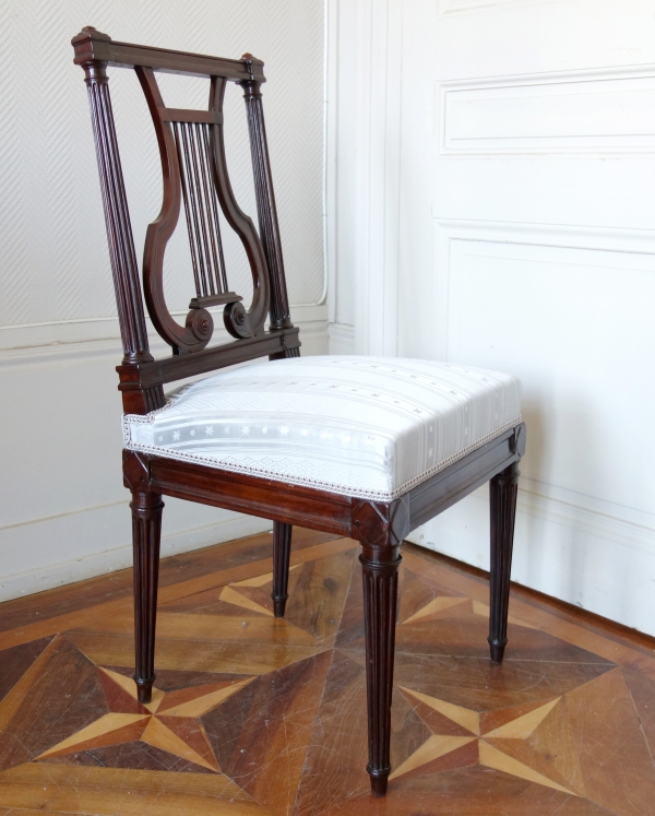 Delaisement : pair of mahogany Louis XVI chairs, lyra-shaped backrest - stamped