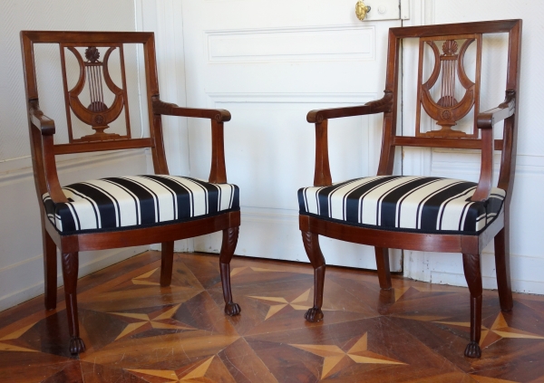 Pair of Directoire mahogany armchairs, lyra-shaped backrest, late 18th century