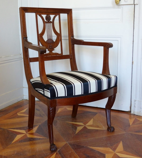 Pair of Directoire mahogany armchairs, lyra-shaped backrest, late 18th century