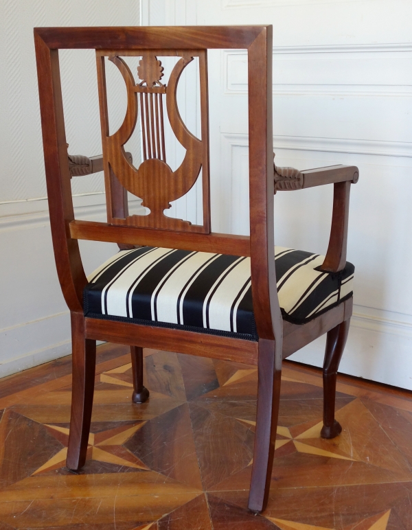 Pair of Directoire mahogany armchairs, lyra-shaped backrest, late 18th century