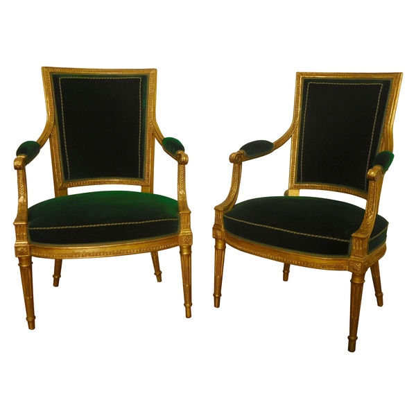 Paire de fauteuils cabriolets en bois doré estampillés JB Boulard, époque Louis XVI