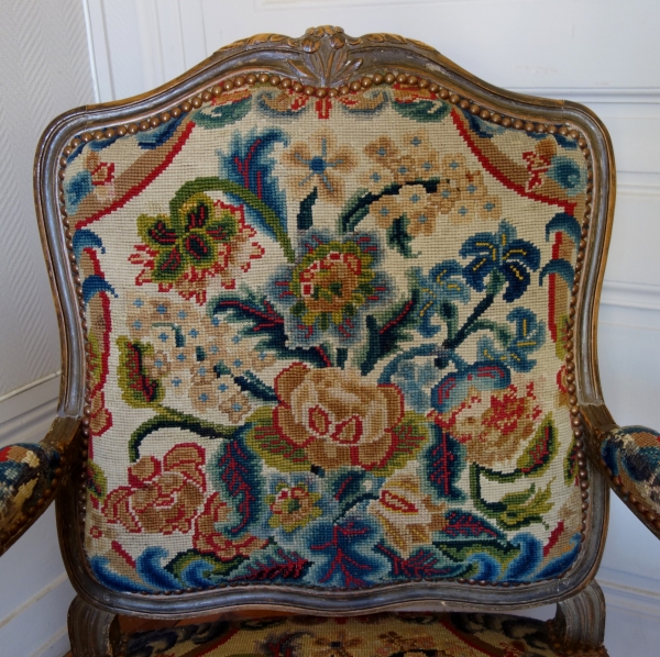 Pair of Louis XV style armchairs covered with 18th century tapestries