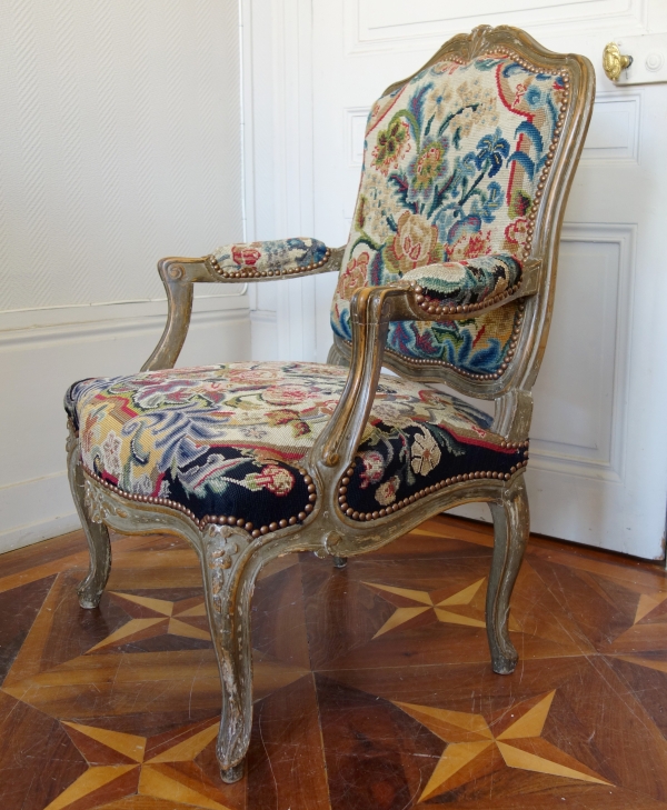 Pair of Louis XV style armchairs covered with 18th century tapestries