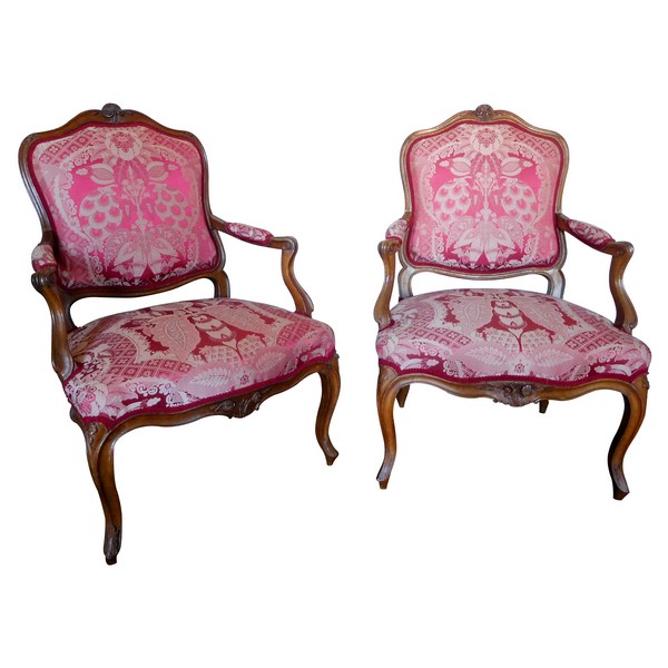 Pair of a la Reine Louis XV walnut armchairs, mid-18th century