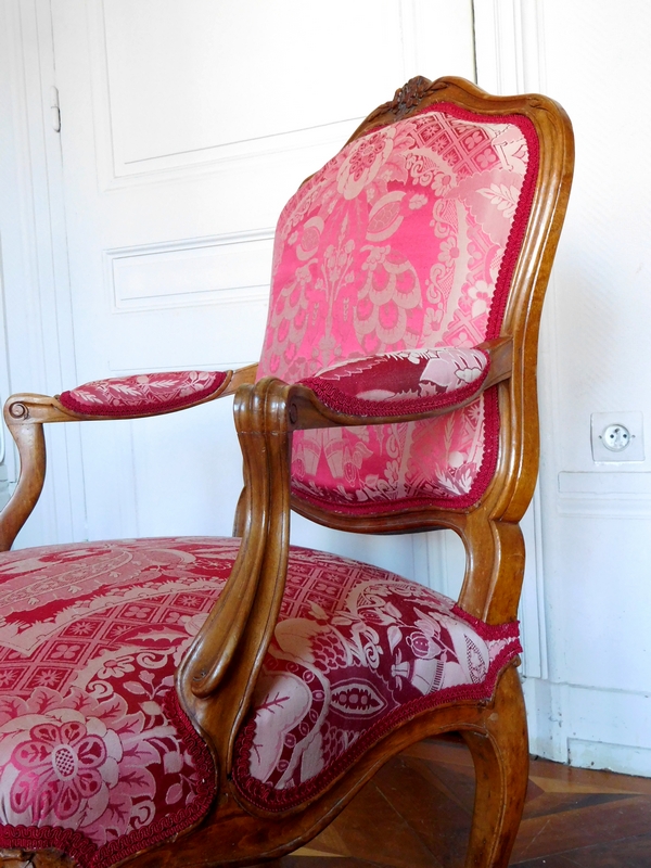 Pair of a la Reine Louis XV walnut armchairs, mid-18th century