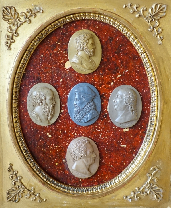 Antique cameos on a porphyry background, gilt wood frame - early 19th century