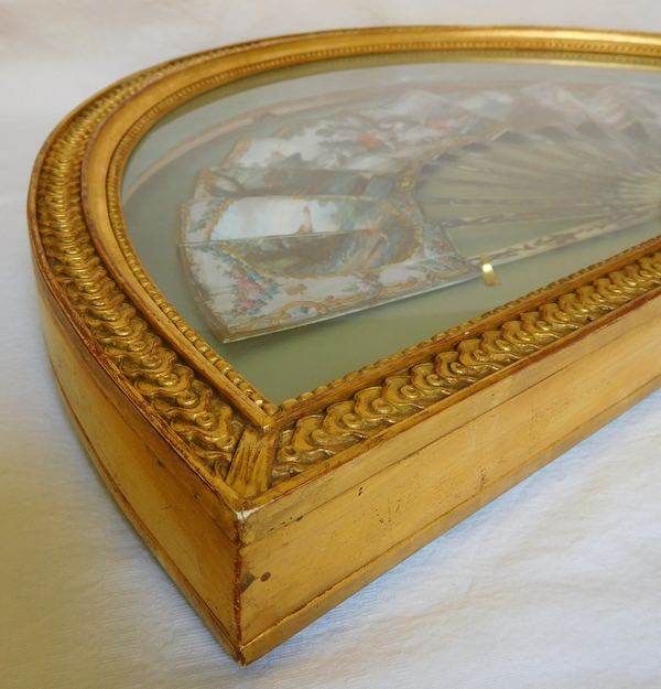 Louis XVI mother of pearl and gouache fan set into its gilt wood frame box