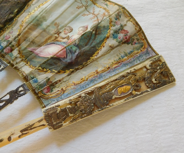 Louis XVI mother of pearl and gouache fan set into its gilt wood frame box