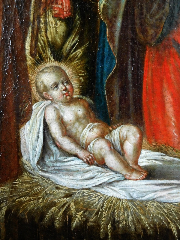 Ecole du XVIIe siècle, huile sur toile : la Nativité - Sainte Famille dans la crèche 76cm x 104cm