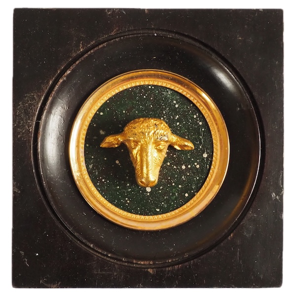 Miniature ormolu lamb head on a porphyry background, souvenir of the Grand tour