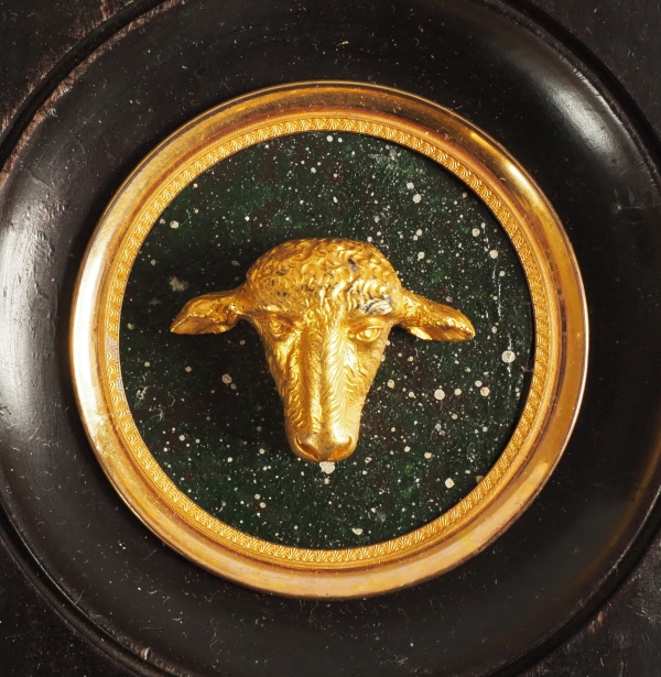 Miniature ormolu lamb head on a porphyry background, souvenir of the Grand tour